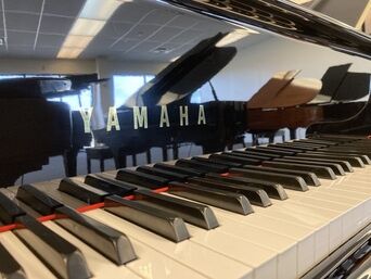 Yamaha GH1 used grand piano keys close up Yamaha GH1 used grand piano keys close up