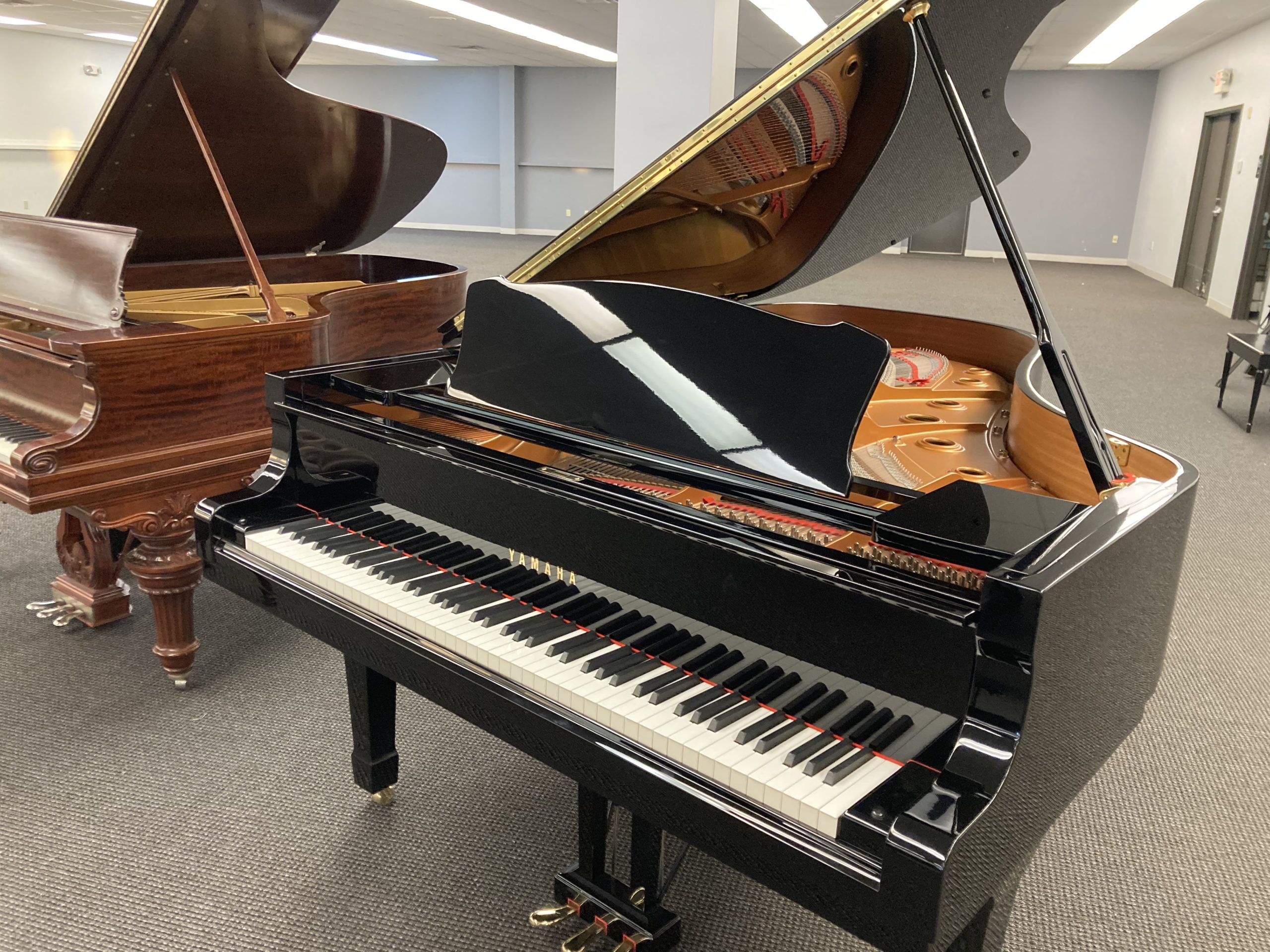 Yamaha DC6 grand piano front right angle view Yamaha DC6 grand piano front right angle view