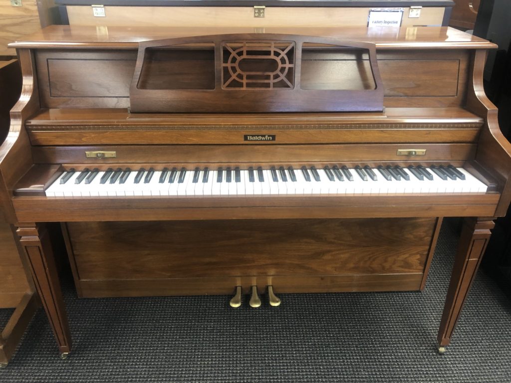 Baldwin Console 1419787 walnut finish upright piano