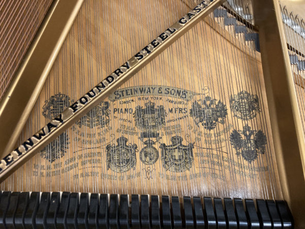 Steinway B 114863 grand piano soundboard strings hammers closeup