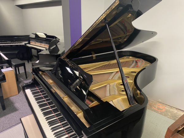 Yamaha C7 grand piano ebony side view