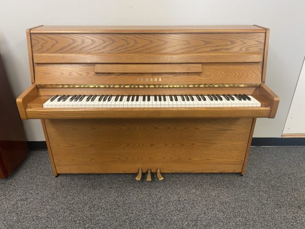 Used Yamaha M1E Oak Console front view without bench