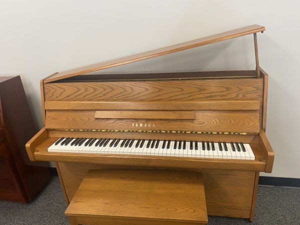 Used Yamaha M1E Oak Console lid up front view