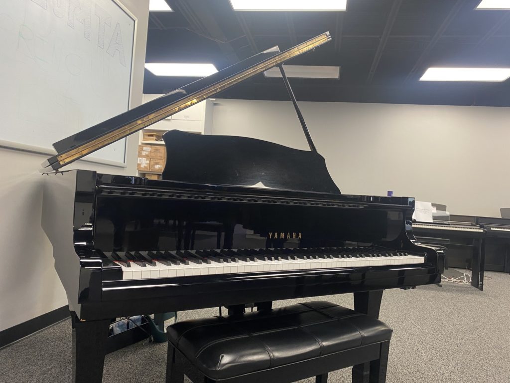 Yamaha G3PE grand piano left front angle view