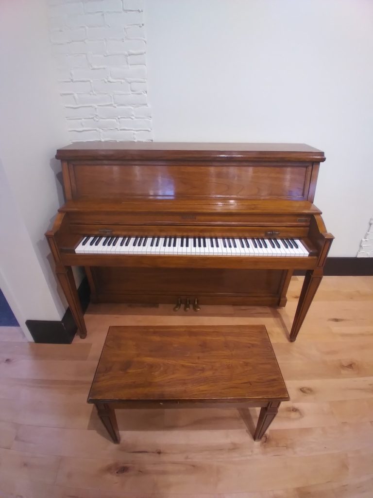 Baldwin 245C upright piano front view