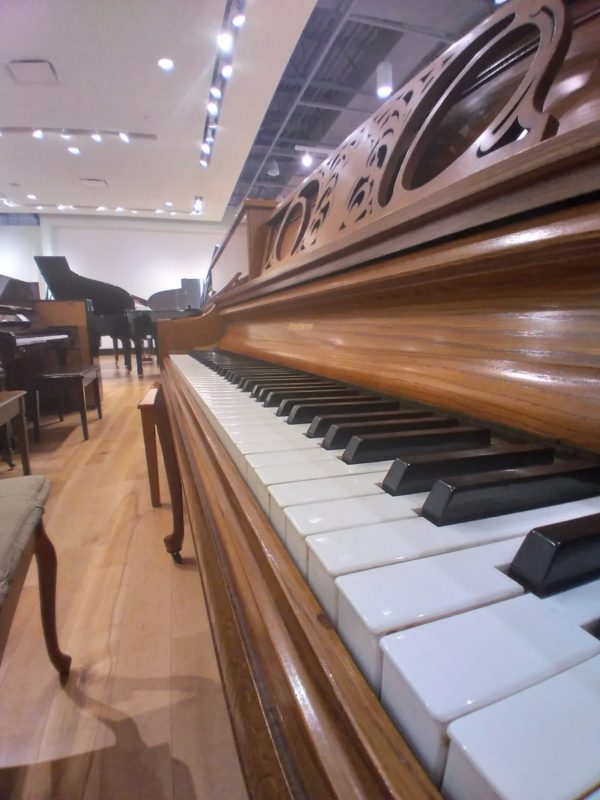 Used Baldwin 5057 upright piano keys close up