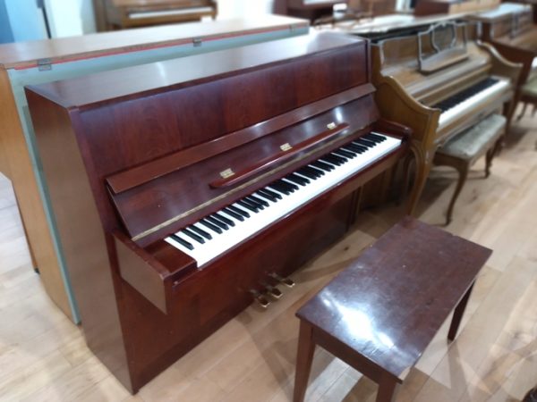 Samick JS-042 upright piano used left angle view