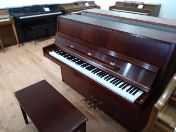 Samick JS-042 upright piano used right angle view