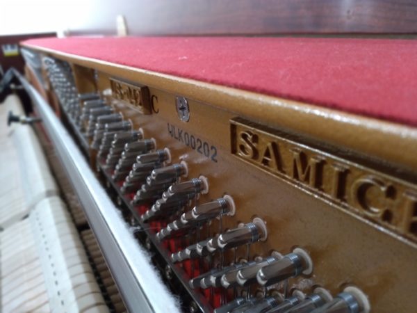 Samick JS-042 upright piano used soundboard serial close up