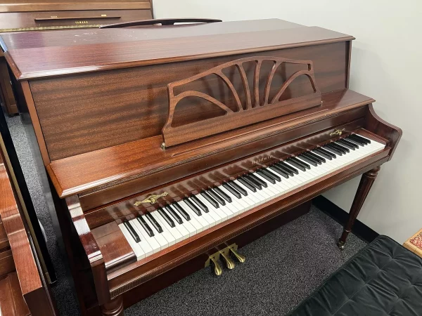 Baldwin Walnut Console Piano Left Side View