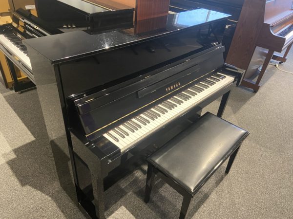 Yamaha T116 upright piano USED left side view