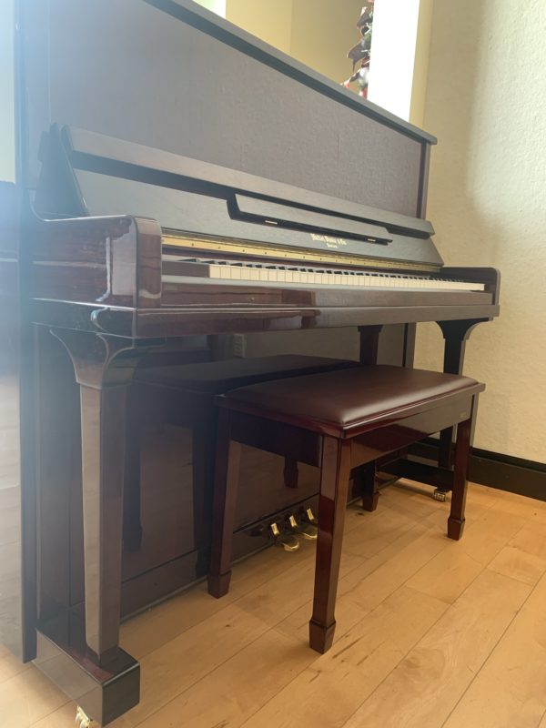 Hallet Davis Used Upright piano sideview close up